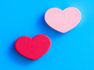 Pink hearts on a blue background