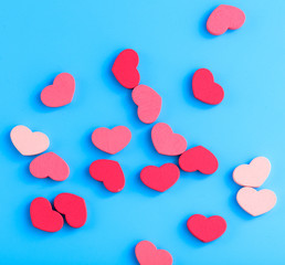 Pink hearts on a blue background