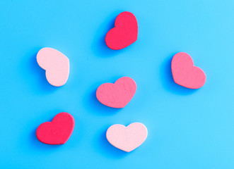 Pink hearts on a blue background