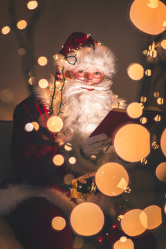 Santa Reading A Book