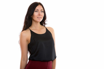 Fototapeta premium Studio shot of young beautiful businesswoman thinking while look