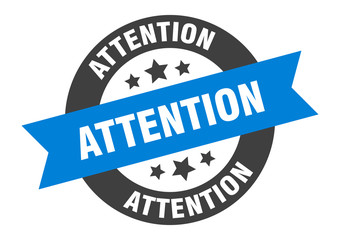 attention sign. attention blue-black round ribbon sticker