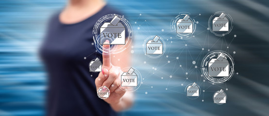 Woman touching an online voting concept
