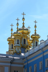Fototapeta na wymiar The beautiful golden church towers of Catherine Palace