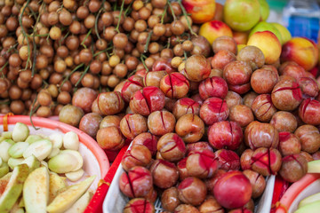mango and pittahaya on the shelves of the Asian market