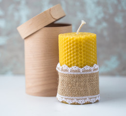 Natural handmade candles made of beeswax in wooden box