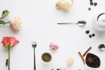 roses , coffee, book on white background with frame, flower postcard for Women's Day, Mother's Day or sale concept. Floral spring background with copy space.