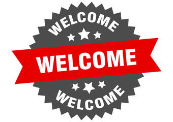 welcome sign. welcome red-black circular band label