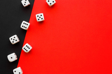 White casino dices on black and bright red background. Mock up for gambling or other games. Empty place for text.