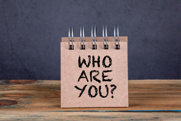 Who are you. Handwriting on an note