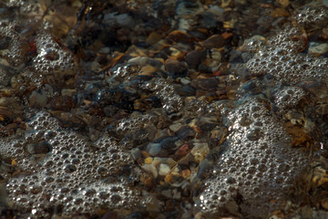 sea pebbles colored granite on the beach