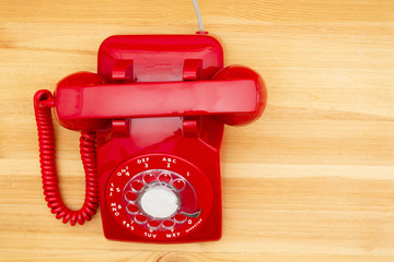 Red old retro rotary landline phone