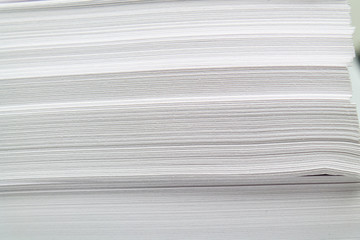 stack of office paper, documents.  macro