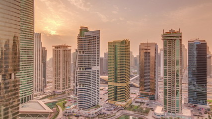 Residential and office buildings in Jumeirah lake towers district timelapse in Dubai
