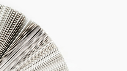 Close-up of book paper with white background