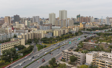 Naklejka premium Urumqi, China - capital of the Xinjiang Uygur Autonomous Region, Urumqi displays several wonderful landmarks. Here in particular the city's skyline