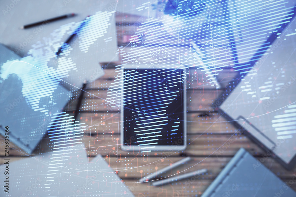 Aufkleber double exposure of world map drawing on digital tablet laying on table background. concept of intern