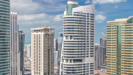 Fototapeta na wymiar Residential apartments and offices in Jumeirah lake towers district timelapse in Dubai