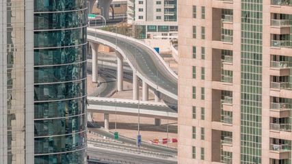 Fototapeta premium Residential and office buildings in Jumeirah lake towers district timelapse in Dubai