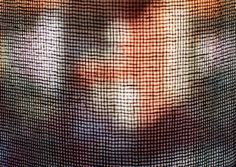 Defocused background obtained from window curtain seeing part of the exterior