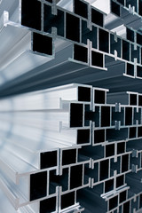 Aluminium Profiles stacked in a storage rack.