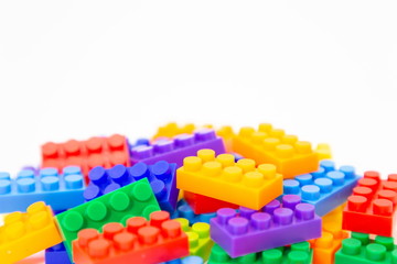 brick blocks toy mini figures colorful on white background . plastic fun collection for child .