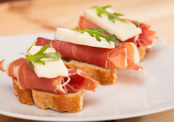 perfect sandwich made with rye bread cheese and Parma ham
