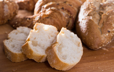 slices of wheaten bread on wooden surface