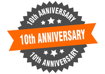 10th anniversary sign. 10th anniversary orange-black circular band label