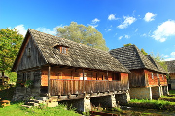 Obraz premium Wooden water mills on source of Gacka river in Lika region, Croatia