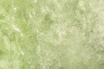 Green textured stucco wall background