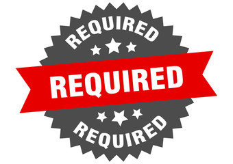 required sign. required red-black circular band label