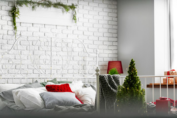 Modern light  bedroom interior decorated for Christmas