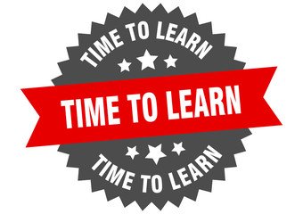 time to learn sign. time to learn red-black circular band label