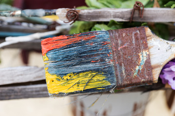 Brush with paints as decoration for an art shop