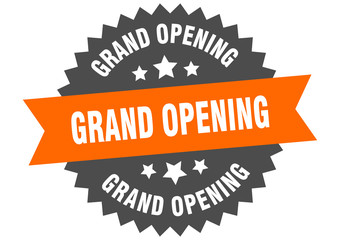 grand opening sign. grand opening orange-black circular band label