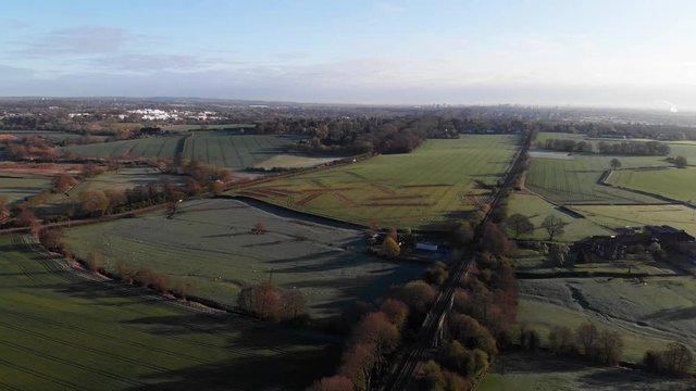 Early Sunny Spring Morning English Landscape HS2 Route Farmland, Railway Kenilworth Coventry Aerial 4K