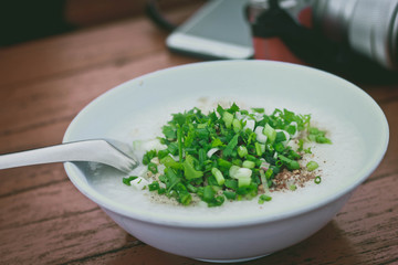 Breakfast porridge pork with eggs