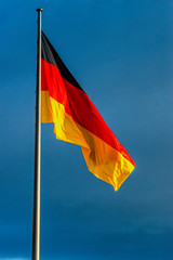 Germany flag black red gold blowing on the flagpole