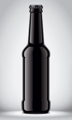 Glass black bottle on gray background
