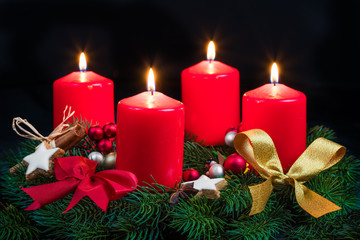 Burning candles on the fourth Sunday of Advent
