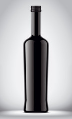 Glass black bottle on gray background