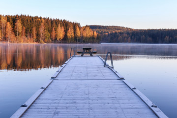 pier on the lake in the morning