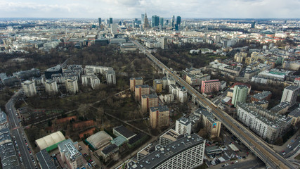 Fototapeta na wymiar Aerial view of the Warsaw cityscape with skyscrapers and buildings in the capital of Poland. 05. October. 2019. Panorama of the city on a cloudy day.