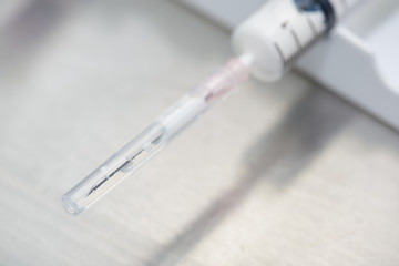Anesthetic drug in syringe on the rack
