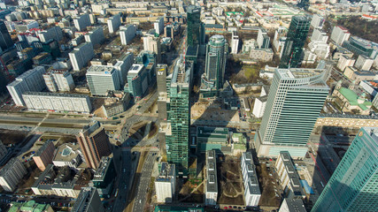 Skyscrapers in the center of the financial district of Warsaw in the daytime. Poland. 10. March. 2019. Aerial view of the cityscape with skyscrapers and buildings in the business center.