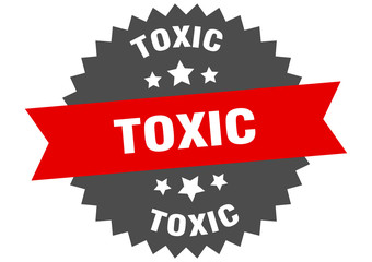 toxic sign. toxic red-black circular band label