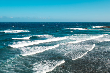 ocean landscape, sea waves on sunny  day with blue sky