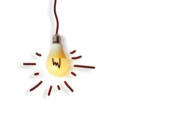 Top view of a luminous energy-saving light bulb on white background. Energy conservation or idea...