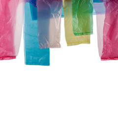 Five plastic shopping bags on bright. Handles.